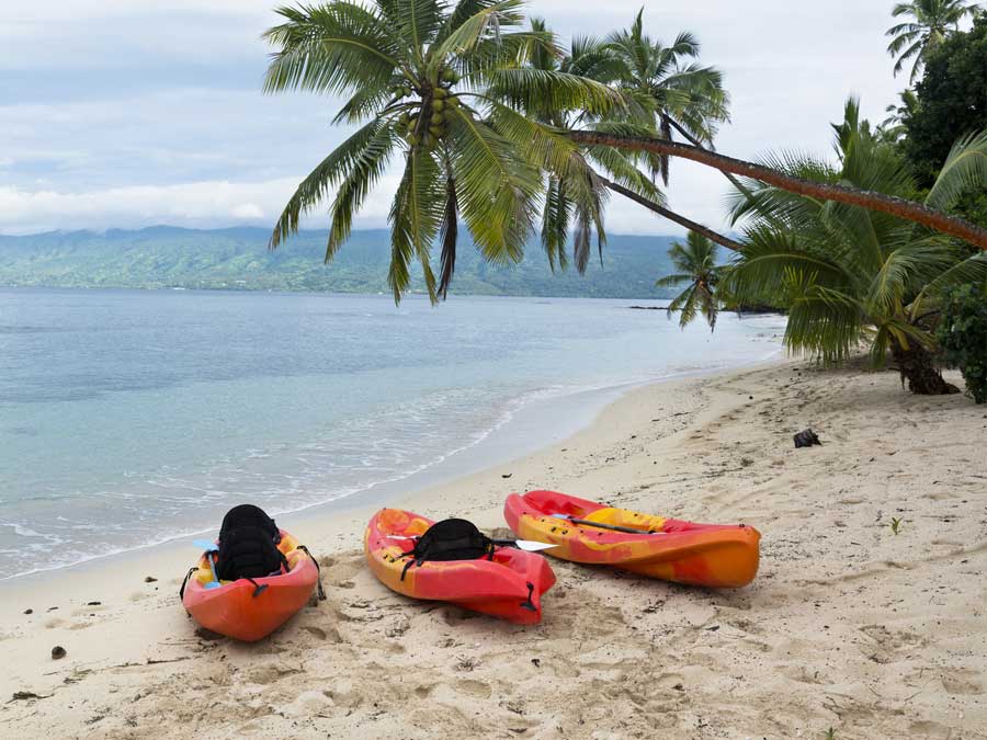 Kayaks on the shore in Fiji