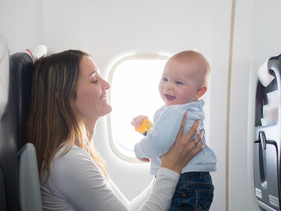 Mum and baby on an airplane