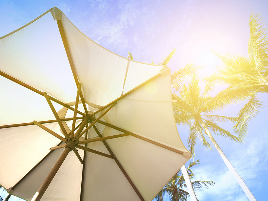 A beach umbrella giving shelter from the Australian heat