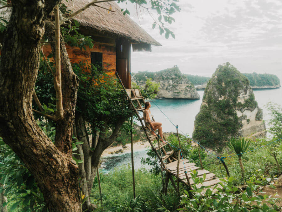 Woman in a tree house, Bali