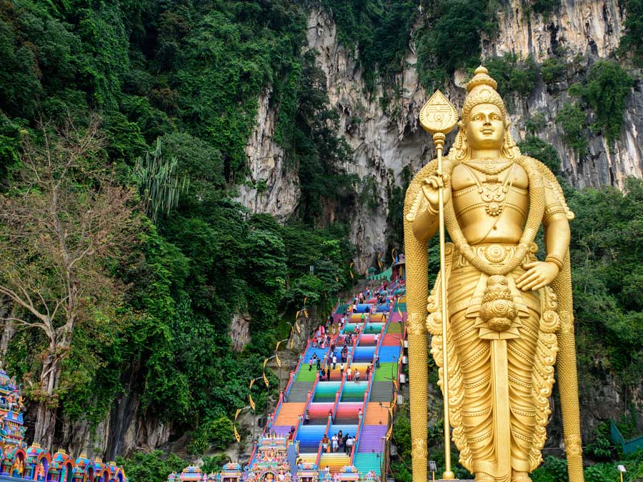 Sunset image of Lord Murugan statue, Batu Caves, Kuala Lumpur, Malaysia