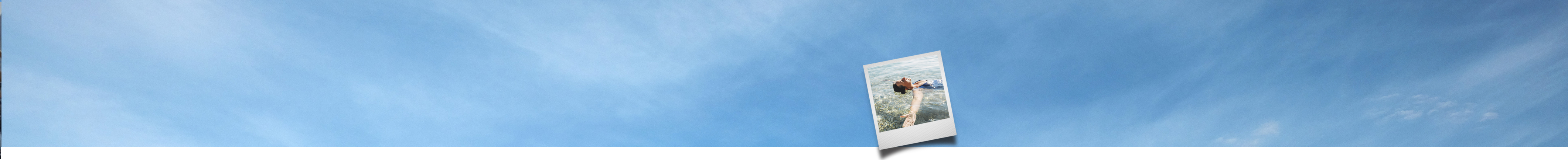 Polaroid against sky