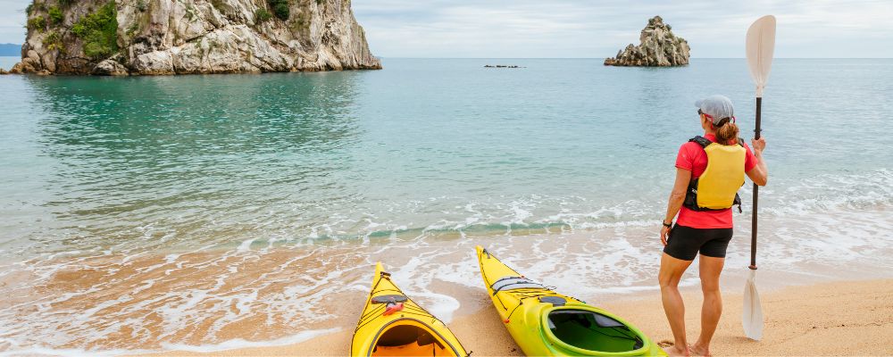 Woman getting ready to kayak