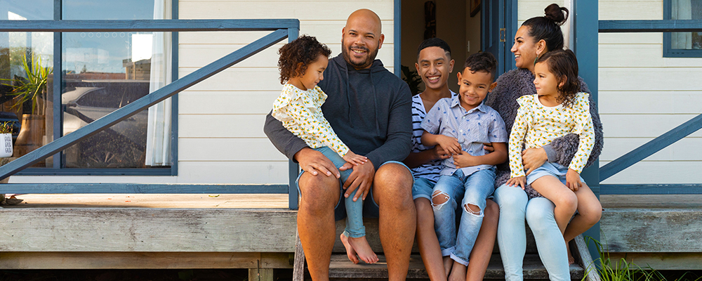 Family sitting on a porch