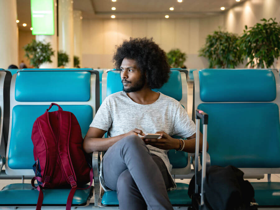 Man waiting at the departure lounge