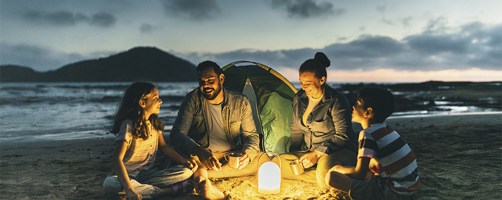 Family on the beach at night 