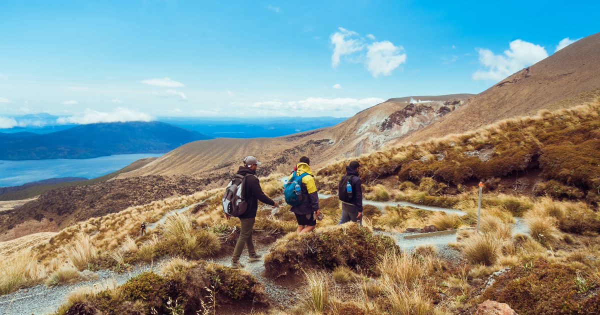 Group hiking through mountains