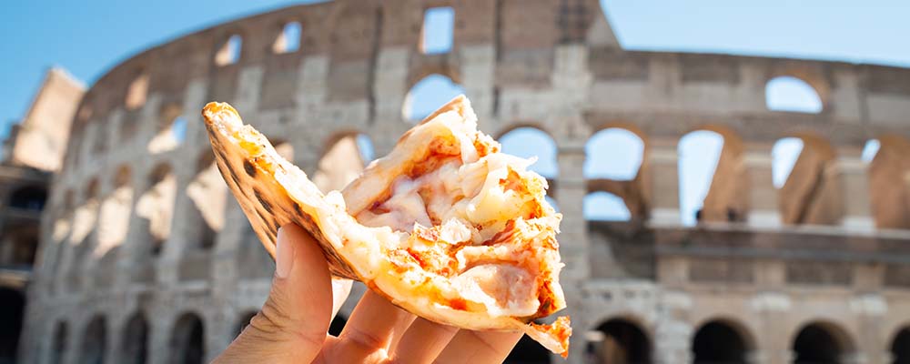 Pizza in front of the Colosseum